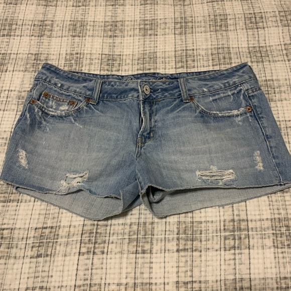 American Eagle outfitters size 10 distressed raw hem blue jean shorts - Picture 1 of 2